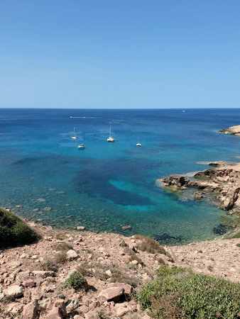 Costa Paradiso, Sardinia, Italy. View of the sea with boatsの写真素材