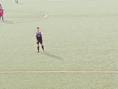 Boys play football at the Orenburg Arenaの写真素材