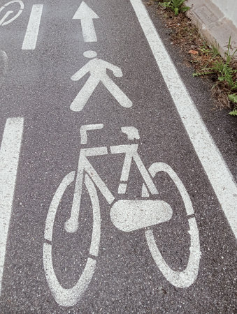 Bicycle lane sign on the road, closeup of photo.の写真素材