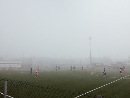Amateur football, in Italy on a foggy dayの写真素材