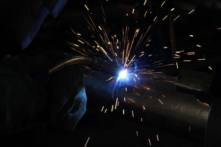 welder, craftsman, erecting technical steel Industrial steel welder in factory technical
