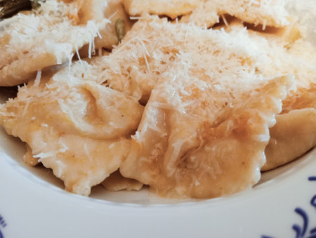 Tortelli and cheese on a plate, close-upの写真素材