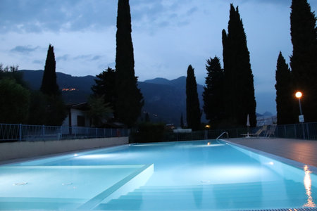 Swimming pool in the evening in a villa in the mountainsの写真素材