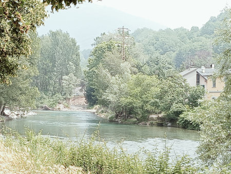 river and forest in the italian alps - retro vintage effectの写真素材