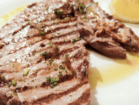 Grilled Tenderloin Steak with Lemon Garnish.の写真素材