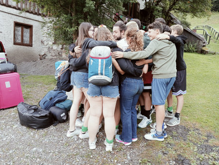 Group of students with backpacks and backpacks standing in a rowの写真素材