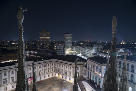 Milan, Italy - January 10, 2018: Night view of Milan, Velasca Tower, Martini Terrace and Royal Palace seen from the roof of the Cathedral (Duomo), Italian Landscape.のeditorial素材