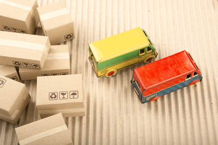 Vintage toy truck with cardboard boxes. Shipping and delivery concept.の写真素材