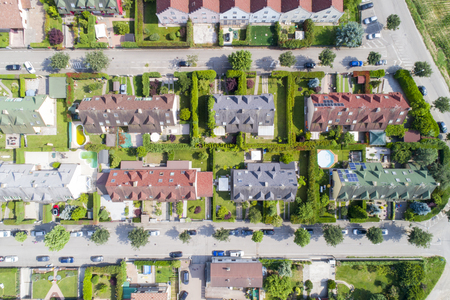 Aerial view of residential houses in suburban area. Looking straight down at a bird's eye view.の写真素材