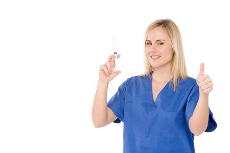 nurse prepare syringe for injection,with thumbs upの写真素材