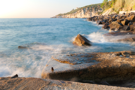 Details of the breakwaters of the waterfront of Marina Lobra of Massa Lubrense, near Sorrento, taken with long time to blur the wavesの写真素材