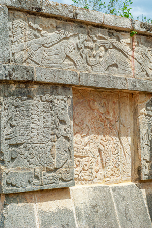 Engraved ornamental stones in the archaeological area of Chichen Itza, on the Yucatan peninsulaの写真素材