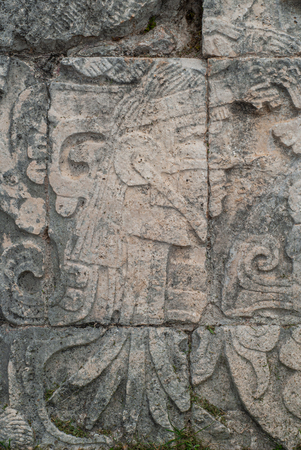 Stone carvings depicting a young Maya, in the archaeological area of Chichen Itza, on the Yucatan peninsulaの写真素材
