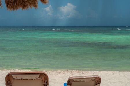 View of Tulum beach, with a summer storm coming, in the Mexican Yucatan peninsulaの写真素材