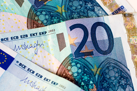 closeup of some banknotes of twenty euro
