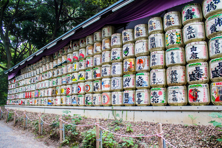stack of barrels of sake offered in Meiji Jingu Shrine  in Tokyo, Japanのeditorial素材
