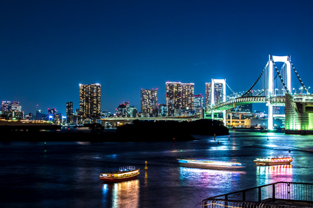 nightscape of Tokyo city, view on the bay and the Rainbow bridge, Japanの写真素材