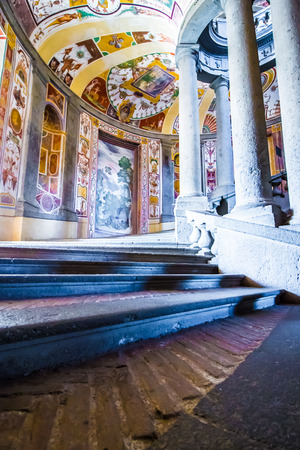CAPRAROLA, Italy - November 1, 2016 -The SCALA REGIA, the principal staircase of Villa Farnese in Caprarola, Italy; a spiral of steps designed by Vignola and frescoed by Antonio Tempestaのeditorial素材