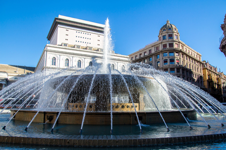 The fountain in the middle of "Piazza De Ferrari", the main square of Genoa, Italyの写真素材