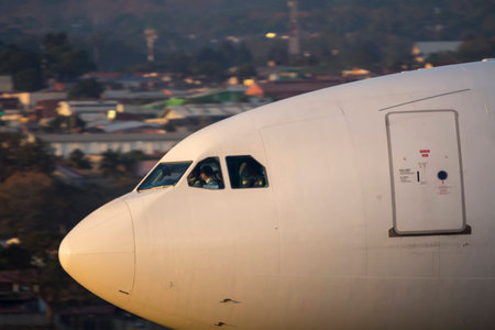 Avion on airport runwayの写真素材