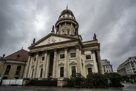 Gendarmenmarkt square with Berlin Concert Hall and French Cathedral in a rainy day, Berlin, Germanyのeditorial素材