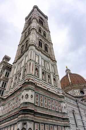 Details of Cathedral of Saint Mary of the Flower, called Cattedrale di Santa Maria del Fiore in Florence Tuscany from Uffizi Gallery. Also known Cathedral of Florence or Duomo Di Firenze.の写真素材