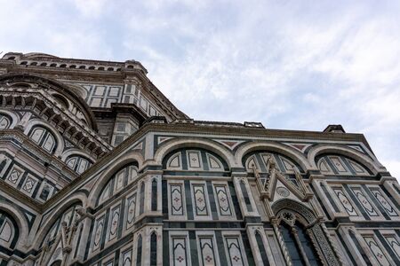 Details of Cathedral of Saint Mary of the Flower, called Cattedrale di Santa Maria del Fiore in Florence Tuscany from Uffizi Gallery. Also known Cathedral of Florence or Duomo Di Firenze.の写真素材