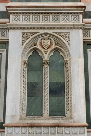 Details of Cathedral of Saint Mary of the Flower, called Cattedrale di Santa Maria del Fiore in Florence Tuscany. Also known Cathedral of Florence or Duomo Di Firenze.の写真素材