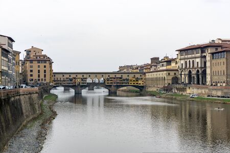 Ponte Vecchio the famous Arch bridge in Florence on Arno river, Tuscany, Italyの写真素材