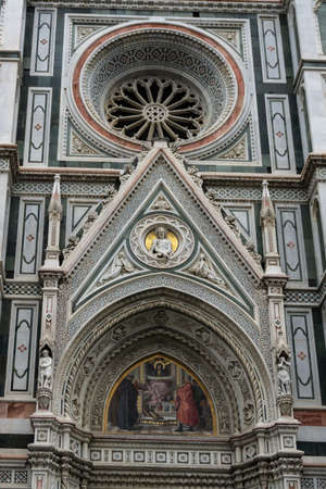 Details of Cathedral of Saint Mary of the Flower, called Cattedrale di Santa Maria del Fiore in Florence Tuscany from Uffizi Gallery. Also known Cathedral of Florence or Duomo Di Firenze.の写真素材