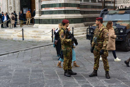 Florence, Italy - March 1, 2019: Military Army outside Saint Mary of the Flower, called Cattedrale di Santa Maria del Fiore in Florence Tuscany.のeditorial素材