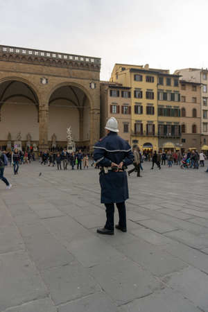 Florence, Italy - March 2, 2019: A police officer on Piazza della Signoria in Florenceのeditorial素材