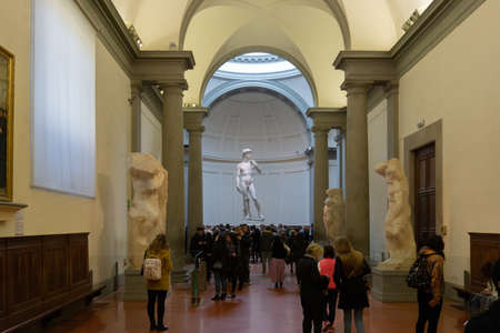 Florence, Italy - March 3, 2019: Renaissance sculpture of David by Michelangelo in Academy of fine arts of Florence (Accademia di Belle Arti di Firenze)のeditorial素材