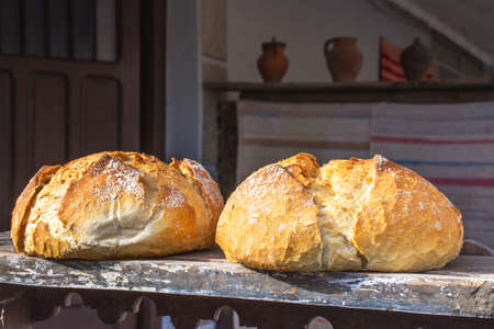 Pieces of crispy bread over wood table