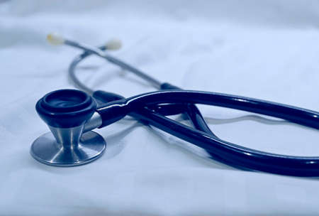 Medical phonend on white background with bluish lightの写真素材