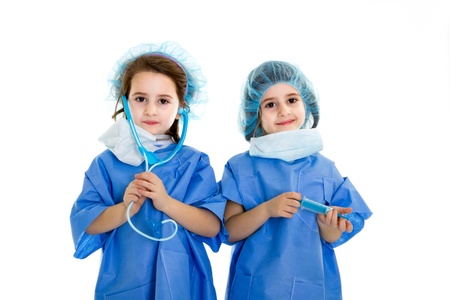 twins doctors with stethoscope and injection equipmentの写真素材