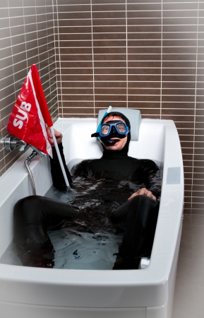 diver with flagの写真素材
