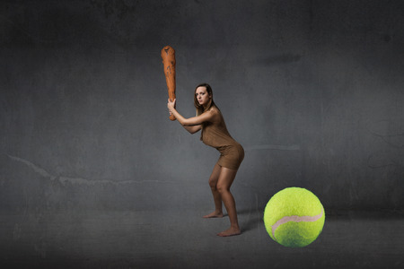 prehistoric first tennis player concept, dark backgroundの写真素材