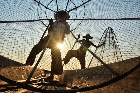Burmese fisherman at Inle lake, Myanmarの写真素材