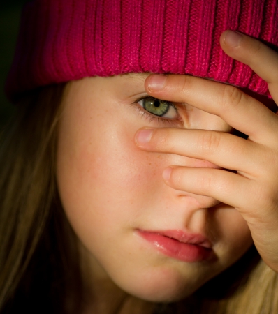 portrait of little girl with fall clothes in natureの写真素材