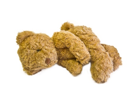 brown teddy bear isolated on whiteの写真素材