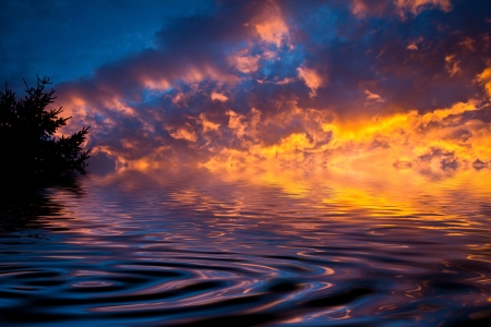 sunset landscape with water reflectionの写真素材