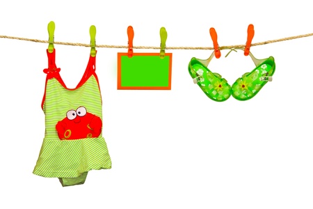 clothesline with swimsuit and flip flopsの写真素材