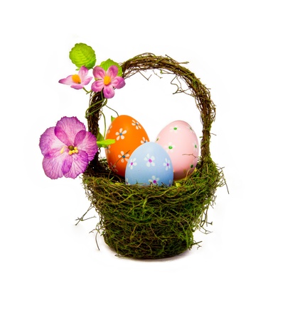 easter eggs in a nest basketの写真素材