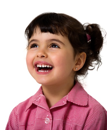 portrait of a little girl with a scool dress isolated on whiteの写真素材