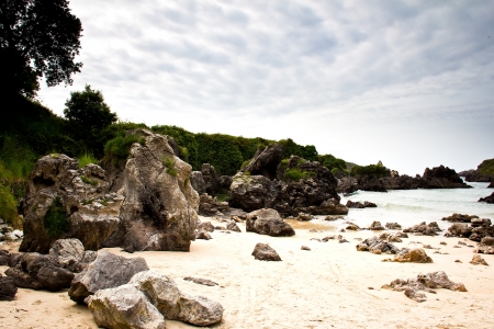 rocky beach landscape in Llanes, Asturiasの写真素材