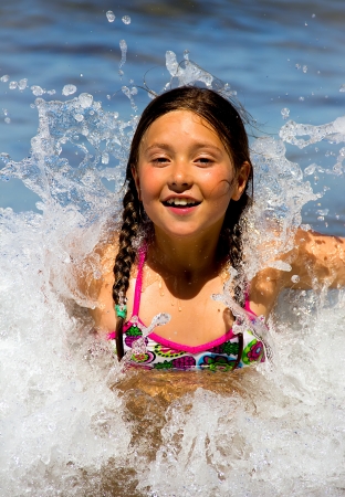 portrait of a little girl on the beachの写真素材