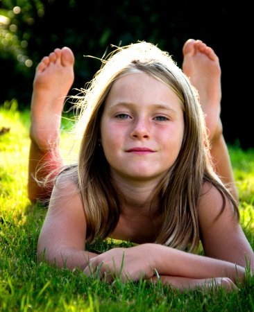 portrait of a little girl in a meadowの写真素材