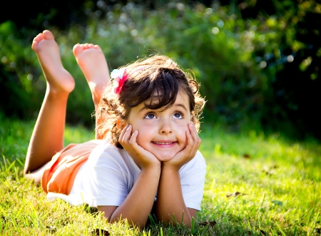 portrait of a little girl in a meadowの写真素材