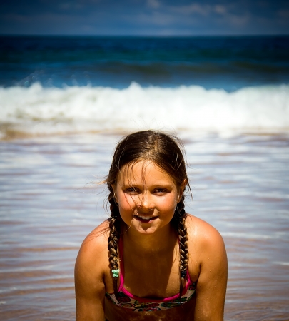 portrait of a little girl on the beachの写真素材
